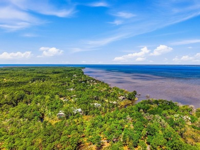 This beautiful waterfront homesite is tucked away in the - photo 14