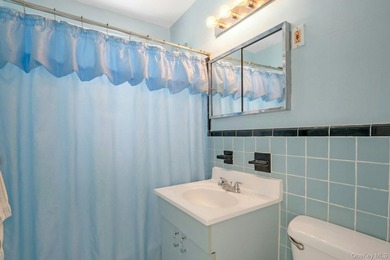This well-maintained brick home offers a spacious and functional - photo 14
