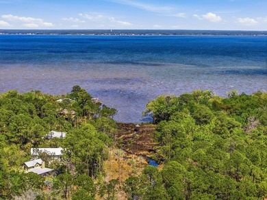 This beautiful waterfront homesite is tucked away in the - photo 15