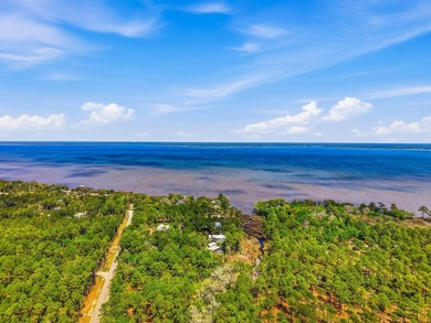 This beautiful waterfront homesite is tucked away in the - photo 17