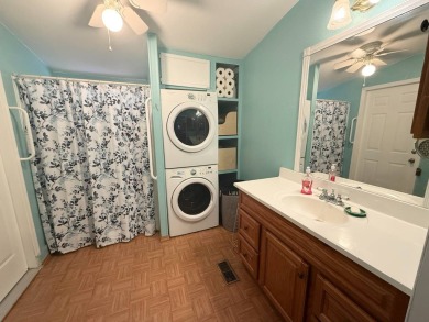 Step into comfort and convenience with this charming 1992 Cavco