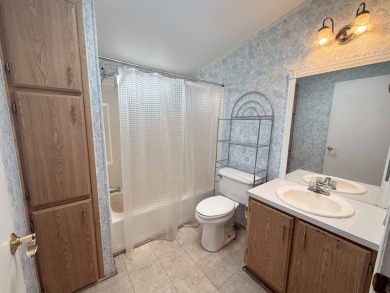 Step into comfort and convenience with this charming 1992 Cavco