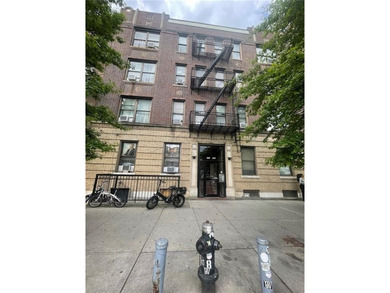 well-maintained 20-family brick building located in the highly - photo 1