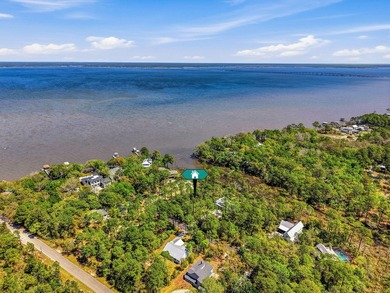This beautiful waterfront homesite is tucked away in the - photo 26