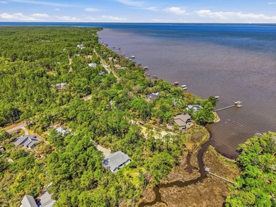 This beautiful waterfront homesite is tucked away in the - photo 31