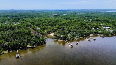 This beautiful waterfront homesite is tucked away in the - photo 36