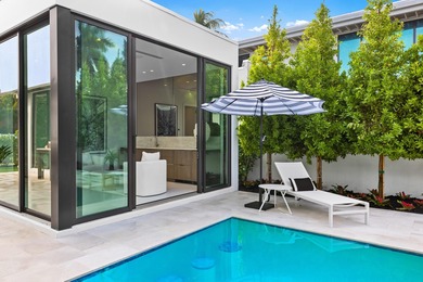 Welcome to 1099 NE 4th Avenue, Boca Raton; a newly completed