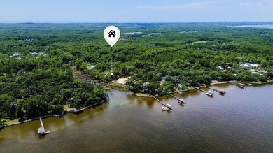 This beautiful waterfront homesite is tucked away in the - photo 39