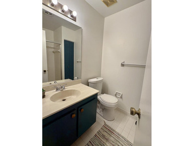 Beautifully updated 2-bedroom, 2-bath second-floor condo located - photo 12