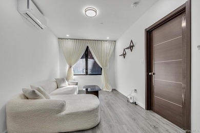 Welcome to this modern 1-bedroom, 1-bath condo located at 42-10 - photo 2
