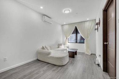 Welcome to this modern 1-bedroom, 1-bath condo located at 42-10 - photo 3