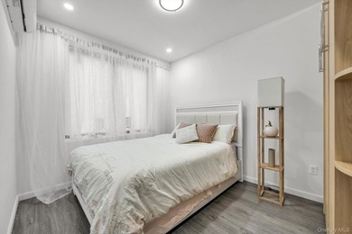 Welcome to this modern 1-bedroom, 1-bath condo located at 42-10 - photo 8