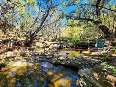 This unrestricted wooded lot offers endless posibilities located - photo 2