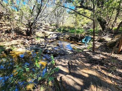 This unrestricted wooded lot offers endless posibilities located - photo 5