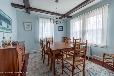 Charming and sun-filled, this 3-bedroom, 2-bath, 1,528 sq ft - photo 4