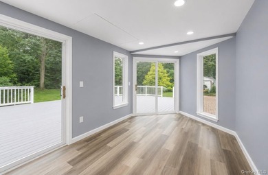 Discover Your Dream Home in Amityville!  Step into this stunning - photo 12