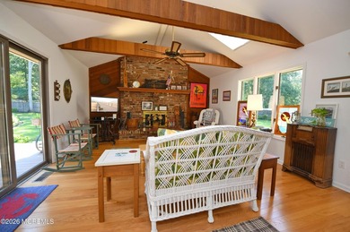 Welcome to this sprawling ranch tucked away on a tree-lined - photo 12