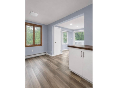 Discover Your Dream Home in Amityville!  Step into this stunning - photo 15