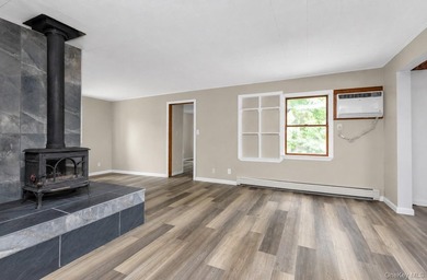 Discover Your Dream Home in Amityville!  Step into this stunning - photo 16