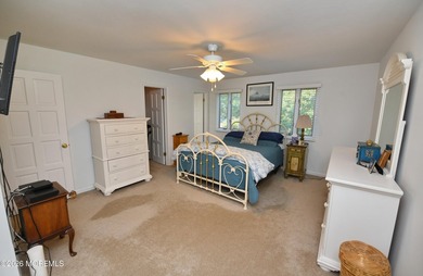 Welcome to this sprawling ranch tucked away on a tree-lined - photo 16