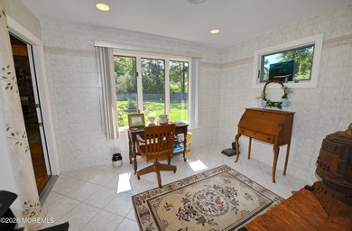 Welcome to this sprawling ranch tucked away on a tree-lined - photo 21