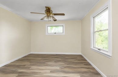 Discover Your Dream Home in Amityville!  Step into this stunning - photo 22