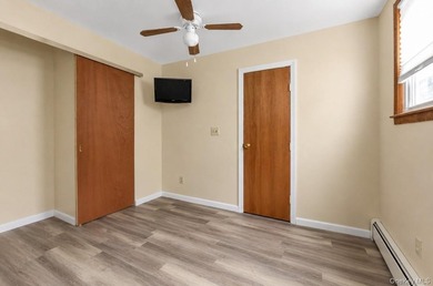 Discover Your Dream Home in Amityville!  Step into this stunning - photo 23