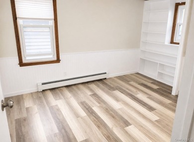 Discover Your Dream Home in Amityville!  Step into this stunning - photo 25
