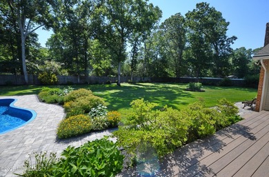 Welcome to this sprawling ranch tucked away on a tree-lined - photo 39