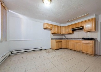 2 family brick home with a 3-bedroom apartment over a 2-bedroom - photo 3