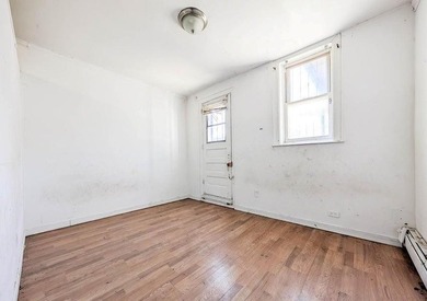 2 family brick home with a 3-bedroom apartment over a 2-bedroom - photo 8