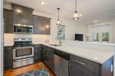 THE PERFECT BEACH CONDO, PRICE IMPROVEMENT! Located in the heart - photo 4