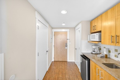 Enjoy stunning bay, golf course, and lake views from this - photo 5