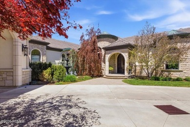 Tucked away on a private, tree-lined lane in Holladay, this - photo 4