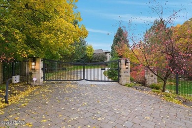 Tucked away on a private, tree-lined lane in Holladay, this - photo 8