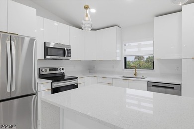 Welcome to this true gem that perfectly blends luxury with - photo 12