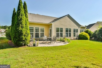 Welcome to this 3-bedroom, 3.5-bathroom home nestled in the - photo 3