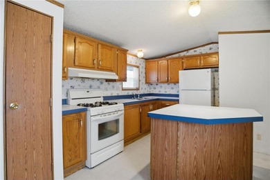 Welcome to this charming 2-bedroom, 1-bathroom mobile home