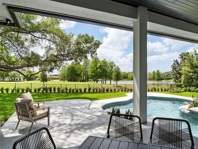 Set along Isleworth's signature 12th fairway, this fully - photo 2