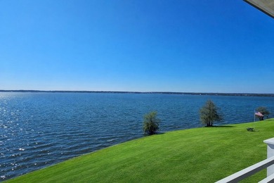 Lakefront Living at Its Best | 1174 Bridgeview Lane Wake up to - photo 4