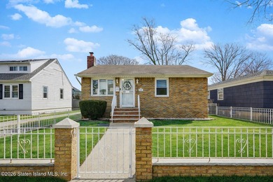 Welcome to 225 Van Name Avenue! This well-maintained 3-bedroom - photo 1
