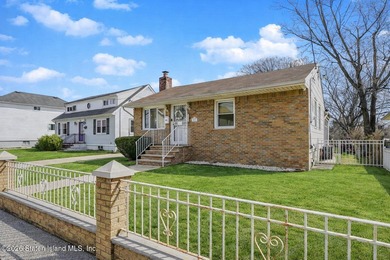 Welcome to 225 Van Name Avenue! This well-maintained 3-bedroom - photo 2