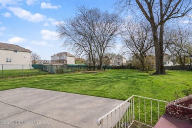 Welcome to 225 Van Name Avenue! This well-maintained 3-bedroom - photo 5