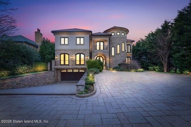 Beyond a private gated entrance and sweeping drive, this - photo 1