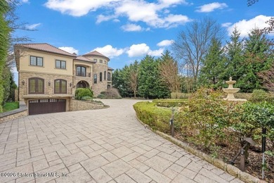 Beyond a private gated entrance and sweeping drive, this - photo 2