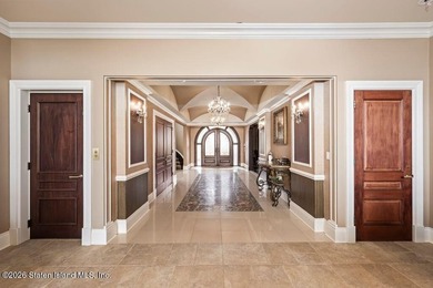 Beyond a private gated entrance and sweeping drive, this - photo 4