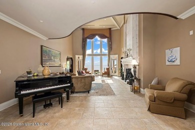 Beyond a private gated entrance and sweeping drive, this - photo 5