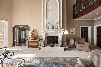 Beyond a private gated entrance and sweeping drive, this - photo 6