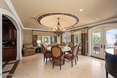Beyond a private gated entrance and sweeping drive, this - photo 10