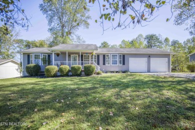 Welcome to this cozy and impeccably maintained home featuring 2 - Lake Home For Sale in Harriman, Tennessee